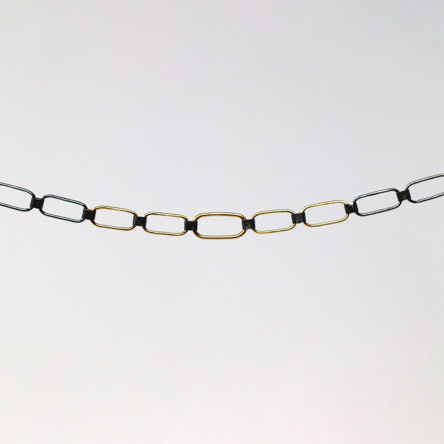 Delicate yet tough flat-link handmade chain choker necklace. Handmade double-sided clasp so you can wear as a tight choker or slightly loose. Perfect for layering with other necklaces. Necklace length including clasp is 16 inches.  Necklace shown in images is blackened sterling silver & buttery 18k gold links. All metals recycled.